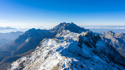 Obraz premium Snowy Mountain Peaks Aerial View