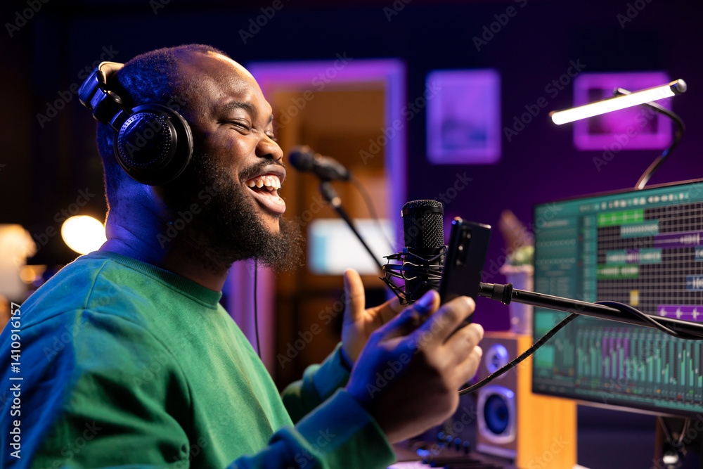 Poster songwriter producer recording a new track in home studio, singing on microphone to create an acousti
