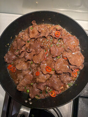 A pan of ox tongue with chilli.