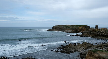 dramatic view of the rocks of papoa in peniche (portugal)
