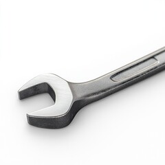 Close-up of a metallic wrench on a white background