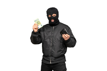 Thief holding euro banknotes and smartphone wearing balaclava