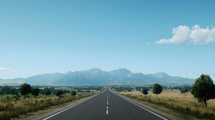 Open Road Leading To Mountains In Rural Landscape