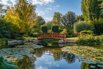 Obraz premium Peaceful garden bridge over tranquil pond