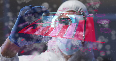 Image of covid cells over male doctor holding screen with medical data processing