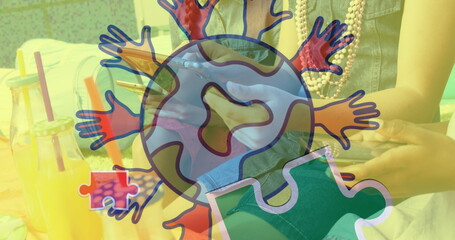 Image of colourful puzzle pieces and globe with hands over friends using smartphone and tablet