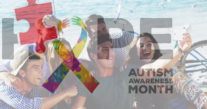 Image of colourful puzzle pieces ribbon and autism text over happy friends at summer beach party - Powered by Adobe