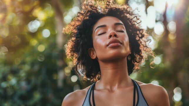 A woman exercising outdoors, promoting sweat for detoxification and healthy skin.