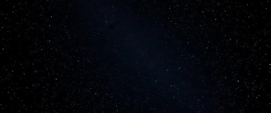 Countless stars glitter against an inky black expanse of night sky, milky way, background
