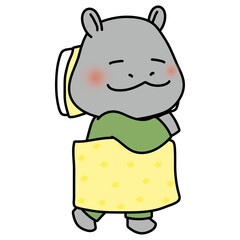 布団で寝ているカバ