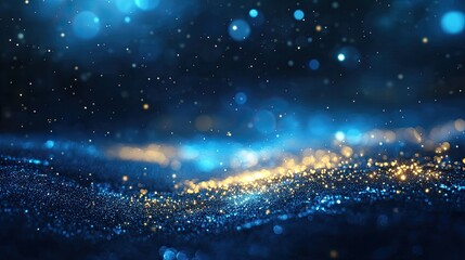 Obraz premium Sparkling Blue and Gold Particles on Dark Background Abstract Image