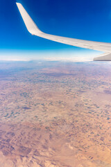 Obraz premium Aerial view on arabian desert and Red sea mountains from airplane