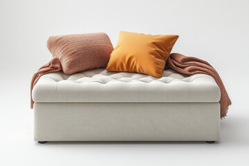 Obraz premium White couch with orange pillows and blanket in a sunny living room.