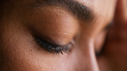 Close up touching forehead tense African American woman female girl skin health eyes vision sight...