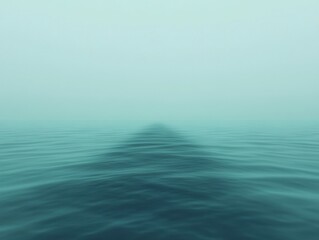 Obraz premium A tranquil scene of calm waters and mist, creating a serene and dreamy atmosphere.