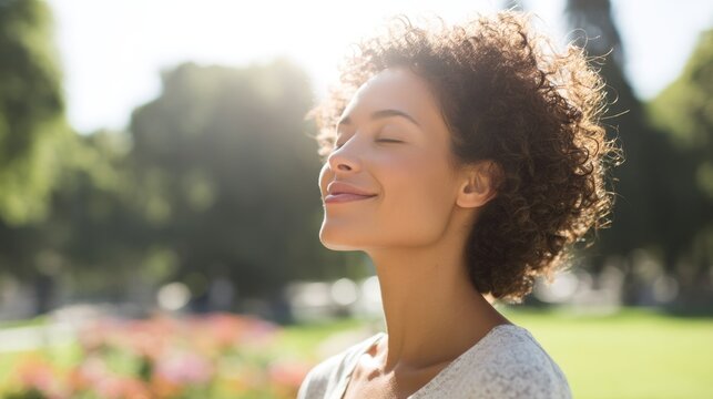 joyful woman stands in sunlit park her face radiant with genuine smile eyes closed in blissful contentment