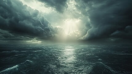 Fototapeta premium Sunbeams Piercing Dark Storm Clouds Over the Ocean: A Hopeful and Inspiring Natural Scene with Vast Expanse and Amazing Energy.