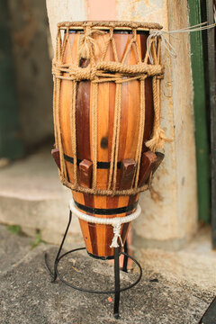 Traditional atabaque, a percussion musical instrument, used in capoeira, candombl&eacute; and umbanda dance, with string and cunha tuning, in salvador, bahia, brazil