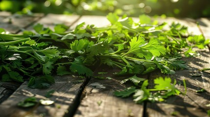 Organic mixed herbs including cilantro and parsley scattered on a weathered wooden surface, glowing in sunlight