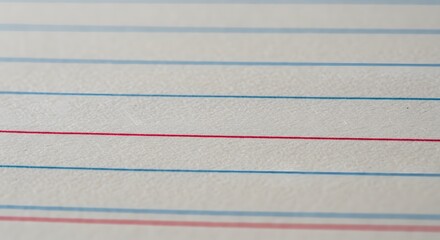 lined paper seamless texture pattern background, a sheet of lined notebook paper, showing the subtle texture of the paper and the light blue lines, red margin line