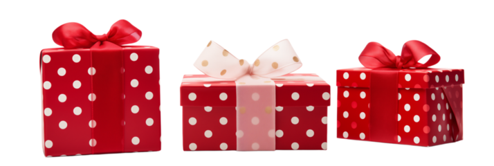 Three presents wrapped in red paper with white polka dots and ribbon bows displayed together png