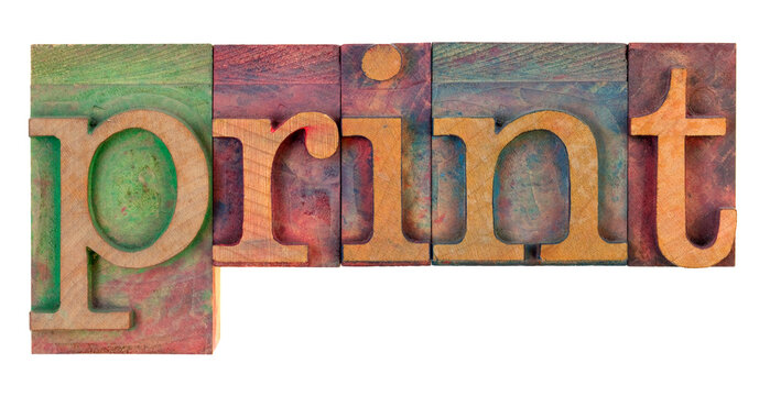 word print in vintage wooden letterpress type blocks, stained by color ink, isolated on white