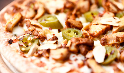Gyros Pizza with jalapeno pepper and mozzarella cheese. Soft focus. Close up.	