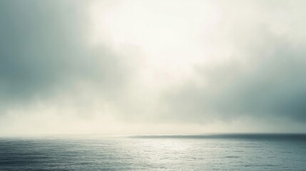Fototapeta premium Moody Seascape with Foggy Horizon and Grey Sky