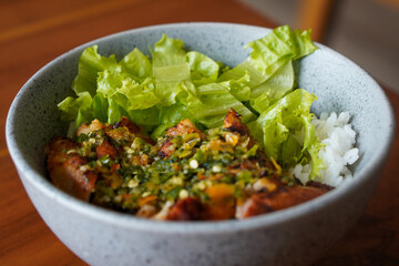 Thai chicken dish, captured on April 16, 2025. Flavorful and aromatic, made with tender chicken, herbs, and spices, offering a bold and savory taste of Thai cuisine