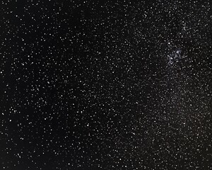 Fototapeta premium A detailed view of the dark expansive night sky is shown