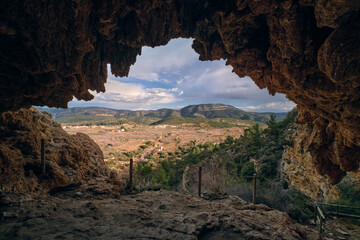 View of the exit from the cave in the mountains