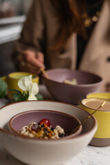 Stylish breakfast with muesli and coffee at café