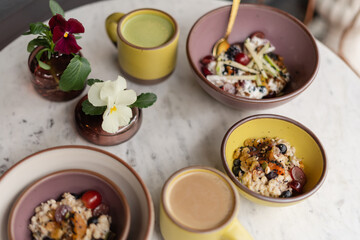 Fresh breakfast and drinks on marble table