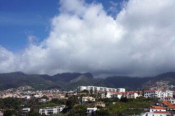 Fototapeta premium Cityscape of Funchal in cloudy day, Madeira, Portugal