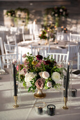 Moody florals and black candles set a romantic tone at a Newport