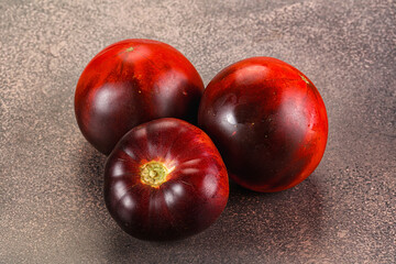 Black ripe juicy organic tomato
