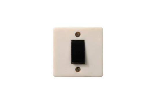 Front view of a vintage electric light switch with a black lever is isolated.