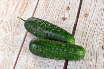 Ripe green raw two cucumbers