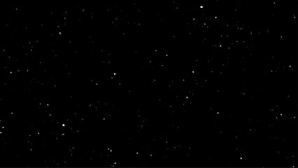 Snowfall on a black background. Real falling snow on a black background for use as a texture layer in a photo design. 