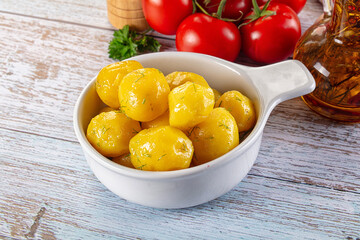 Boiled young potato with oil