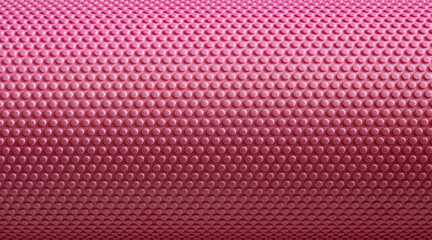 Pink yoga mat textured surface showing dot pattern