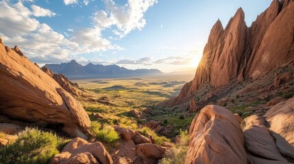 Golden sunlight bathes the rugged rock formations in a desert landscape, showcasing a breathtaking horizon and rolling hills as dusk approaches