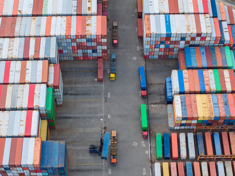 Forklift at shipping port construction with Container terminal in port
