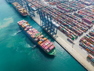 Aerial view of Manufacturing logistics cargo container ship at ship port.export import business...