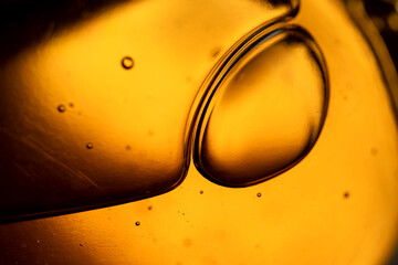 The surface of the cosmetic product has bubbles. blurred background. soft focus