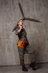 Obraz premium Person in military jumpsuit with utility belt