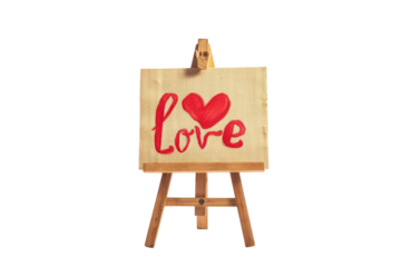 A handcrafted wooden sign with the word love, featuring a red heart on an easel set against a bright, minimalist background isolated on transparent background