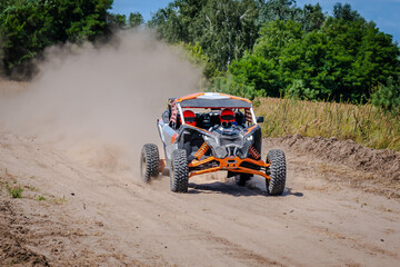 UTV buggy, rally or 4x4 in the action on sand