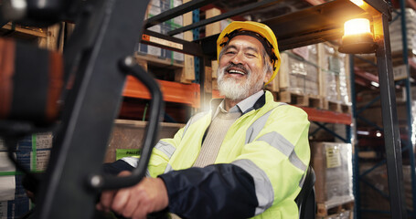 Warehouse, logistics and man in portrait with forklift, supply chain and shipping for distribution. Factory, mature person and worker with machine for driving, delivery and manufacturing with smile © peopleimages.com