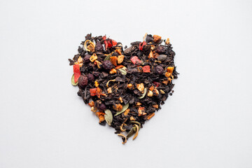 Fruit dry tea with cranberry petals and candied fruits. Dried herbal drink. Black tea with fruit...